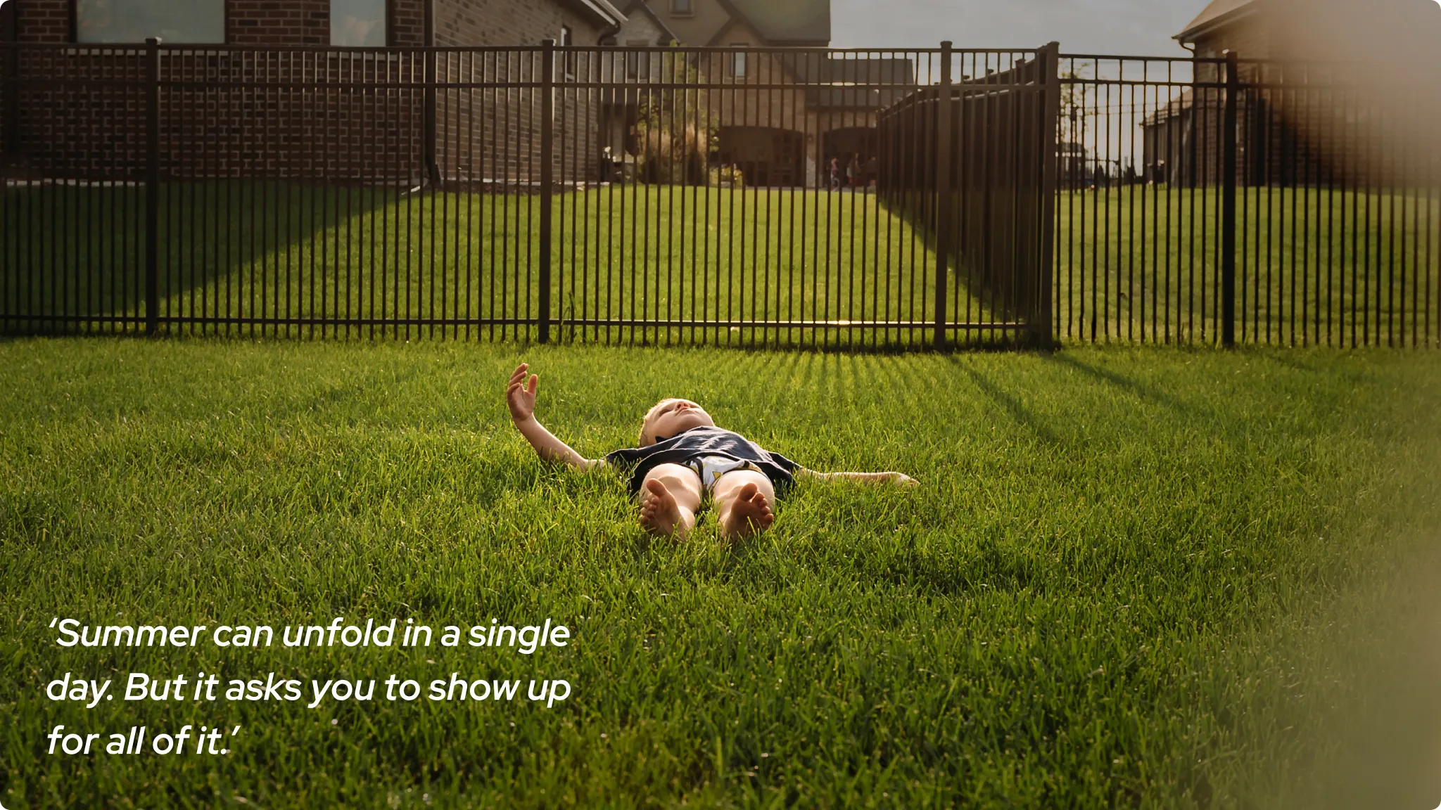 kid laying in garden
