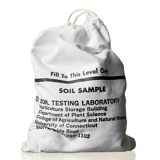 Different types of soil amendments and gloves