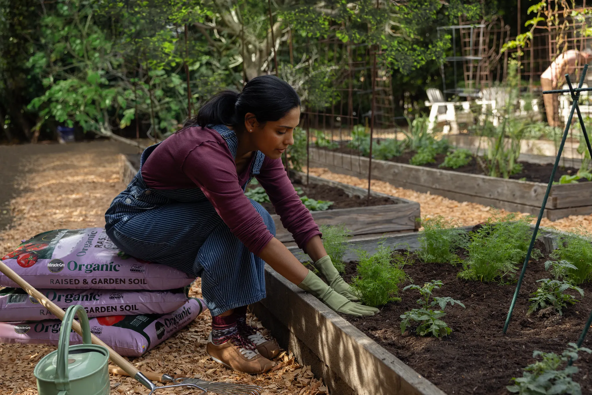 Woman sitting on bags