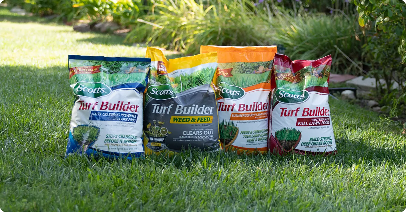 Save 20% on lawn care by receiving all seasonal Turf Builder products in one upfront delivery. Image shows a complete set of seasonal lawn food bags on a healthy green lawn.