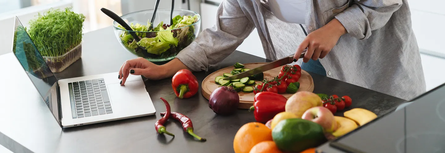 women chopping veggies