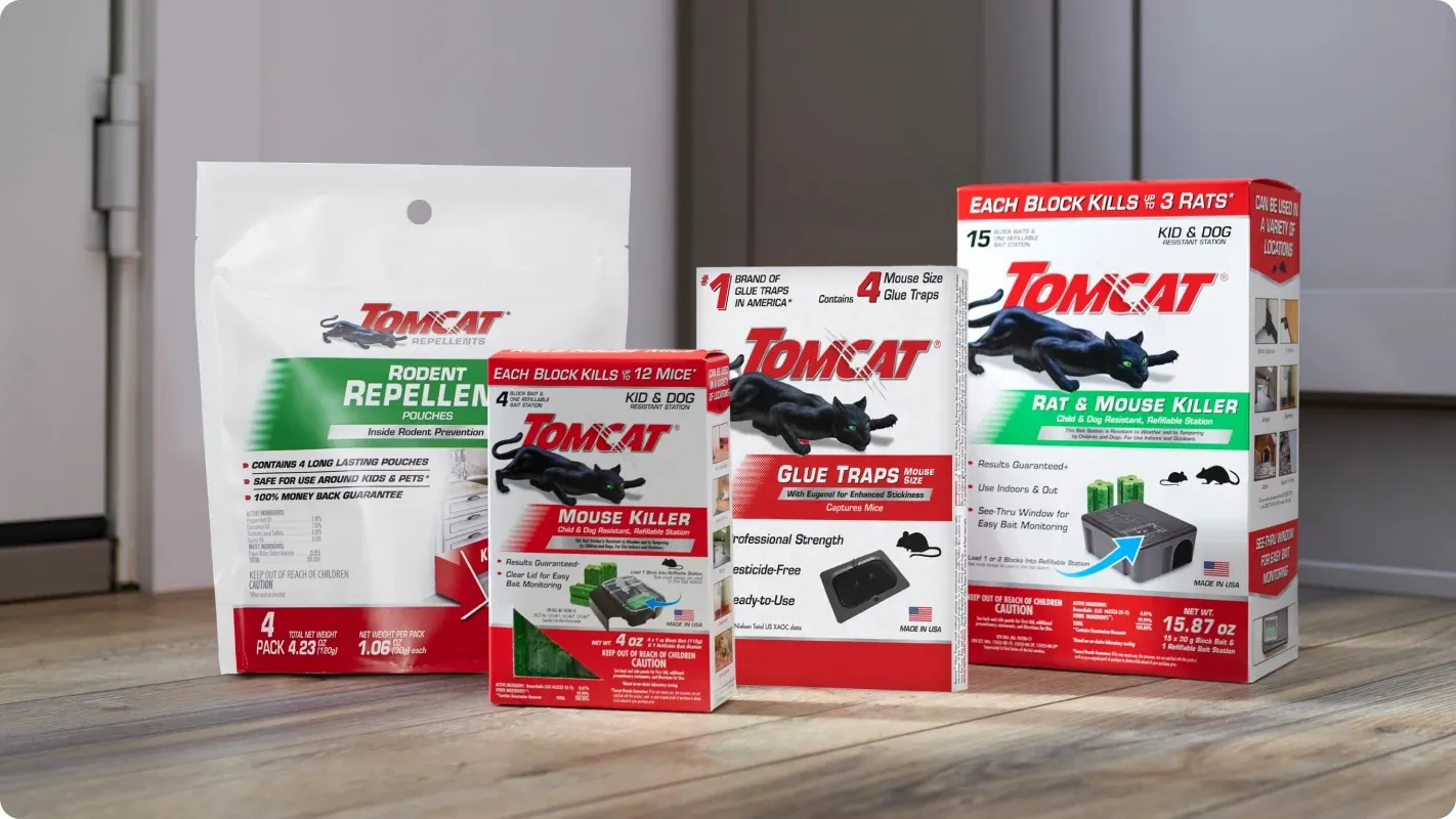 Assorted Tomcat brand rodent control products, including mouse killer bait, glue traps, and repellent.