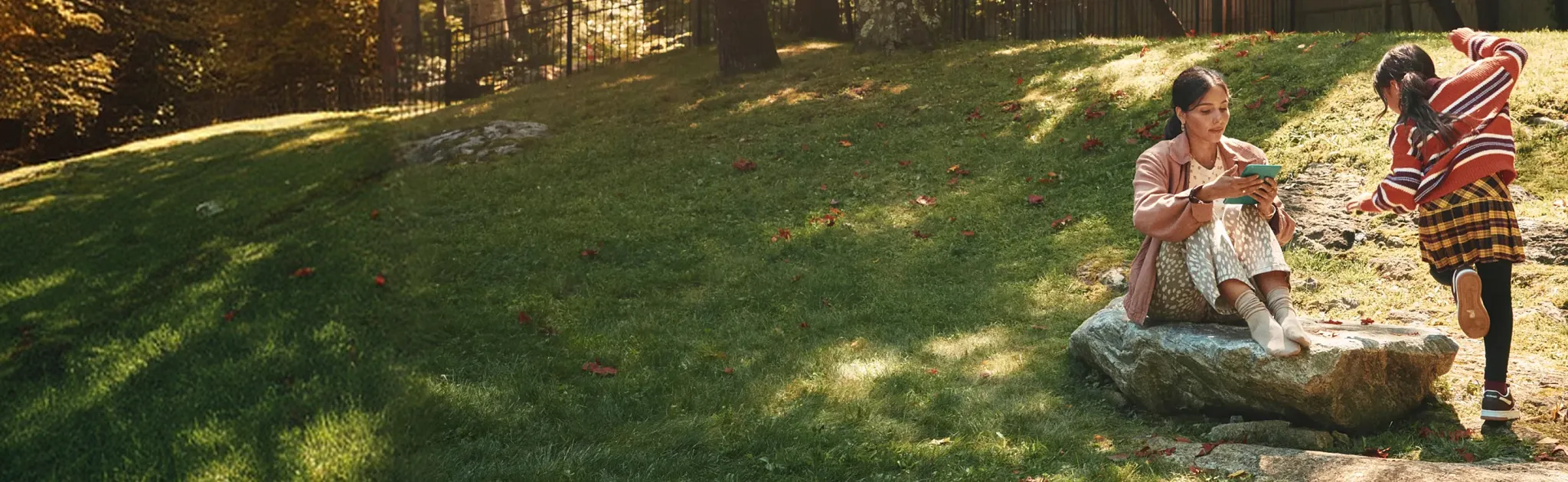 mother and daughter working in the garden