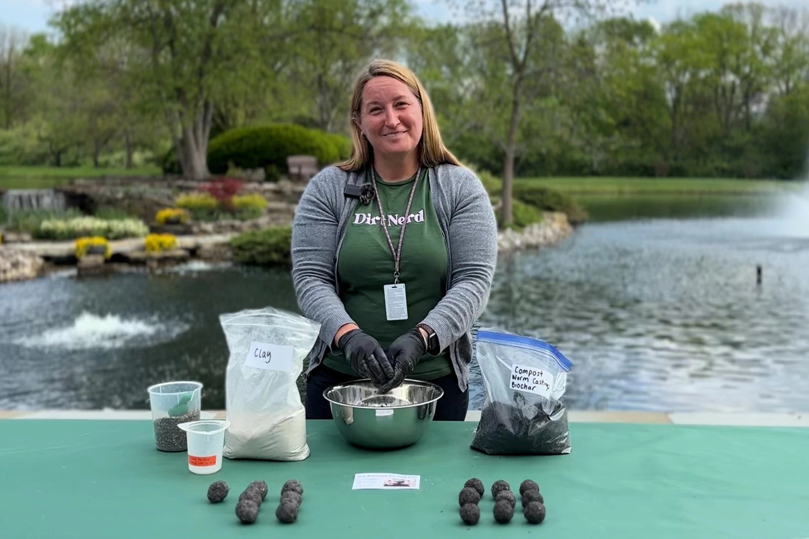 Making seed bomb balls with wildflower seeds, clay and compost